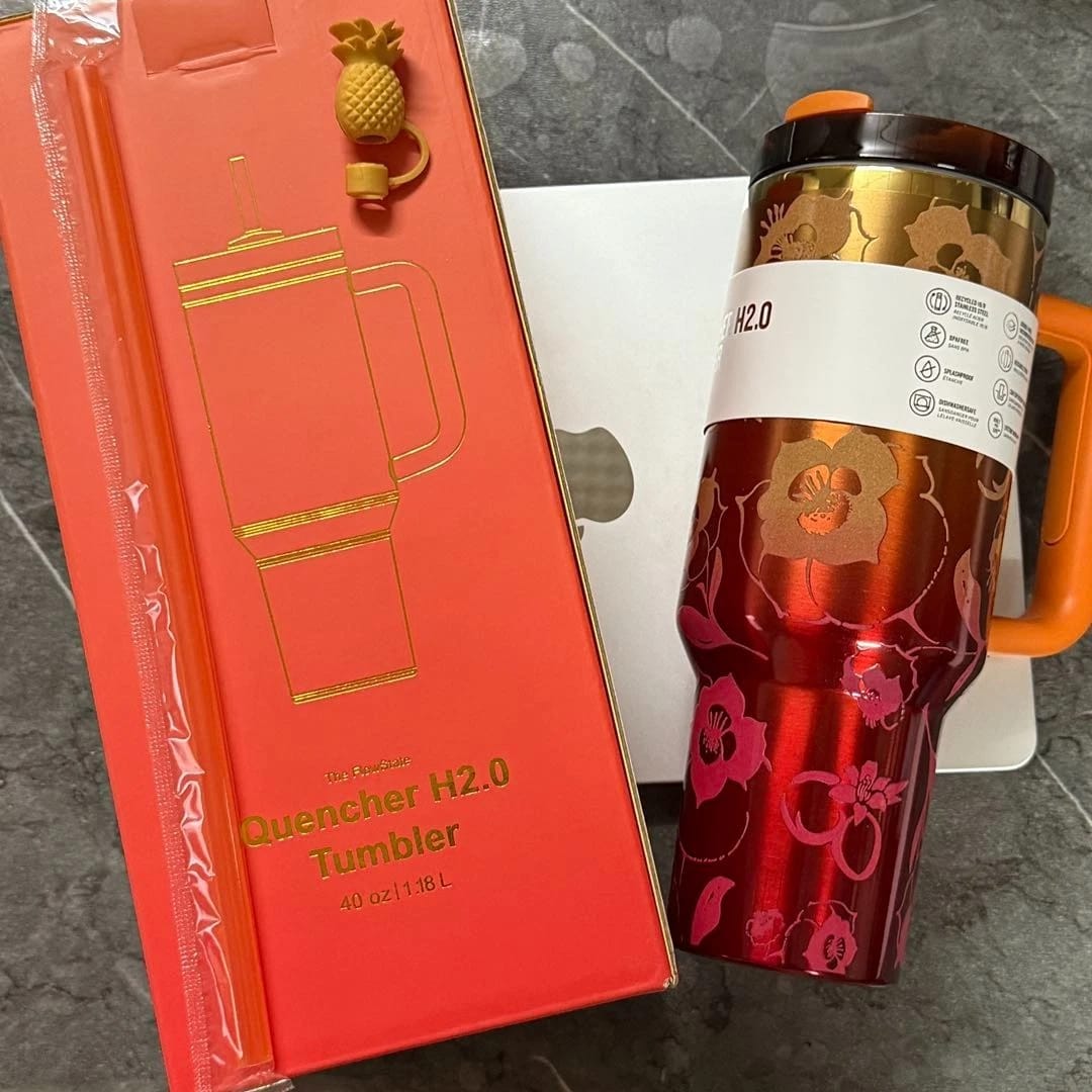 The Stanley 1913 x KAROL G 40oz Quencher H2.O FlowState Tumbler Limited Edition